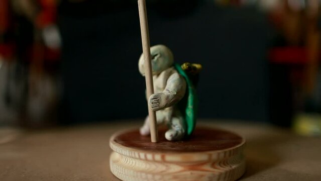 netsuke ninja toy close-up rotation