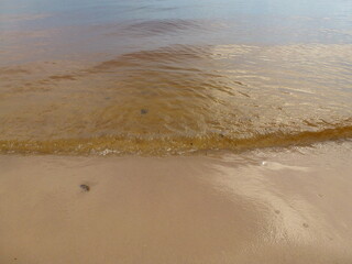 reflection water and sand, rider