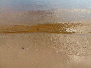 reflection water and sand, rider