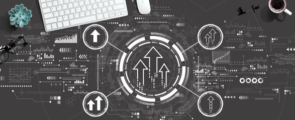 Rising arrow theme with a computer keyboard and a mouse