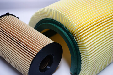 Automotive filters used in the maintenance of a modern car close-up. Selected focus.