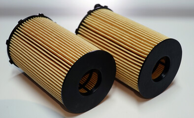 Automotive filters used in the maintenance of a modern car close-up. Selected focus.