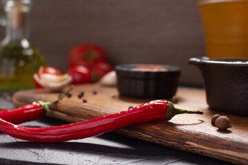 Chilly pepper for homemade cooking at table. Chilli pepper on tabletop