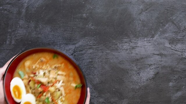 Serving a Bowl of Curry Ramen Noodles