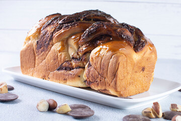 Chocolate Walnut Braid Bread, displayed on gray background