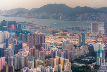 Aerial view of the skyline of the city of Hong Kong and mountains on the horizon, China