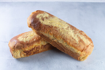 Corn and cheese bread, displayed on gray background