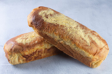 Corn and cheese bread, displayed on gray background