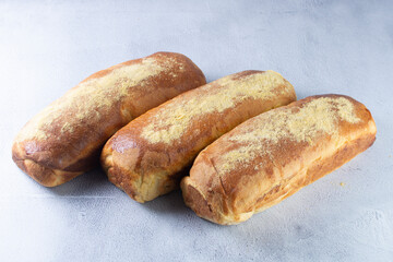 Corn and cheese bread, displayed on gray background