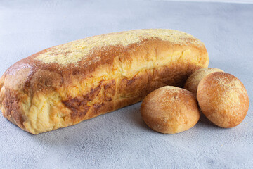 Corn and cheese bread, displayed on gray background