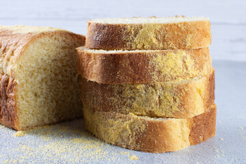 Corn and cheese bread, displayed on gray background