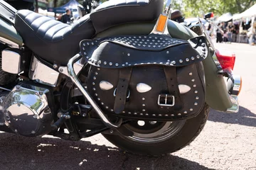 Poster Classic black saddlebags with rivets and buckles for custom motorbike © Julia