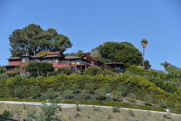 Fototapeta na wymiar Malibu, California, USA - April 3, 2022: Beautiful house along Escondido Canyon Trail