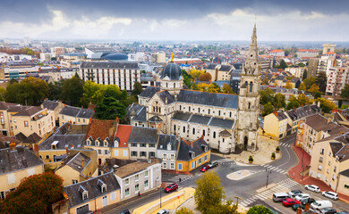 Aerial view of picturesque Chateauroux cityscape with Catholic Church of Our Lady, central France - obrazy, fototapety, plakaty