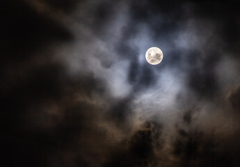 Naklejka na ściany i meble the moon is sheltered by the clouds V2