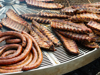 Many of charcoal grilled Spanish meat products selling on fair.