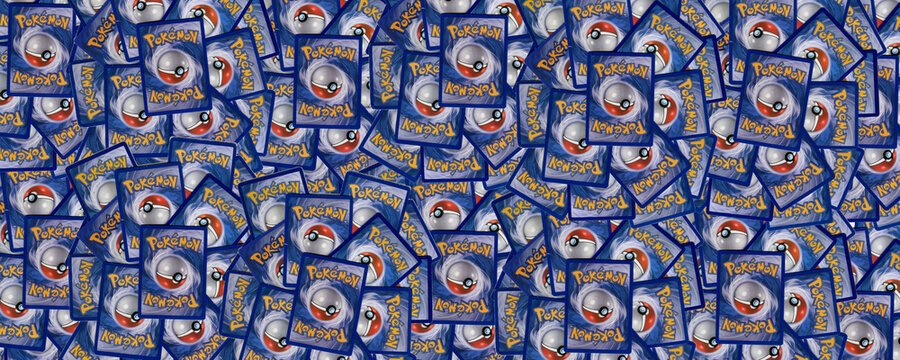 Collection of the backs of authentic used Pokémon trading cards banner heading, collectable Japanese game.