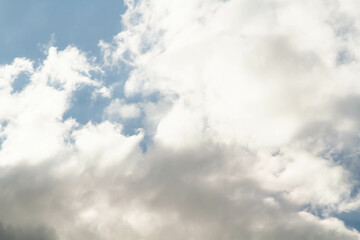Cumulus clouds. White clouds on a blue background.