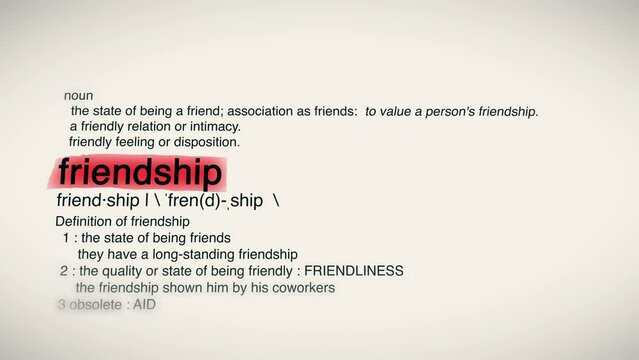 The Word Friendship Red Highlighted in a Dictionary Animation