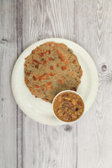 Indian traditional food aloo with beans gravy and multigrain Roti	