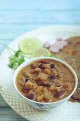 Indian traditional food aloo with beans gravy and multigrain Roti	
