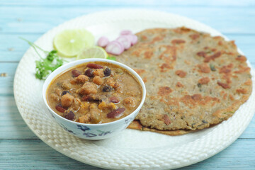 Indian traditional food aloo with beans gravy and multigrain Roti	
