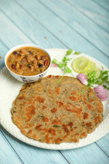 Indian traditional food aloo with beans gravy and multigrain Roti	

