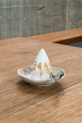 Bakery pandoro on white plate at cafe , Italian Christmas sweet bread cake.