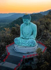 Fototapeta premium Aerial view of Wat Doi Prachan Mae Tha or Wat Phra That Doi Phra Chan in Lampang, Thailand
