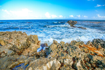 Paradise, sunset, Waves with rocks Cozumel Mexico