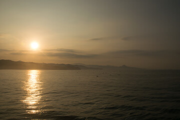 Naklejka premium sunris above above the beautiful yellow pacitan sea