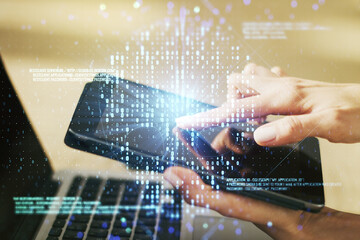 Creative concept of code skull illustration and finger clicks on a digital tablet on background. Hacking and phishing concept. Multiexposure