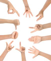 Set of many children's hands showing different gestures on white background