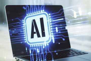 Double exposure of creative artificial Intelligence icon with modern laptop on background. Neural networks and machine learning concept