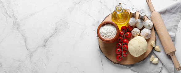 Ingredients for pizza on light background with space for text