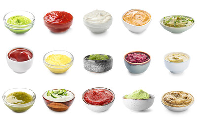Set of different tasty sauces in bowls on white background