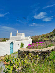 Greek Island House. Copy Space. Traditional whitewashed house on a Greek island. Sky in the background. Stock Image.