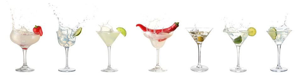 Set of tasty martini cocktails with splashes isolated on white