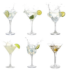 Set of tasty martini cocktails with splashes isolated on white