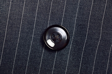 Close up of Button on Pinstripe Suit