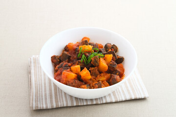 Sambal Goreng Ati Kentang, javanese (Indonesia) traditional food. Served in white bowl