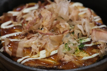 extreme close up of Okonomiyaki. Traditional Japanese pancake food