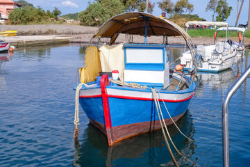Old fishing boat berthed at sea resort