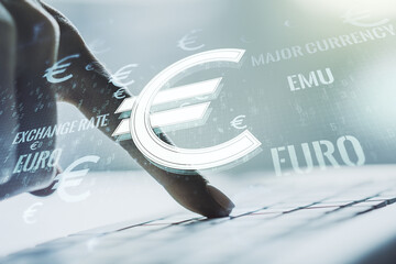Creative EURO symbols illustration and hands typing on computer keyboard on background, forex and currency concept. Multiexposure