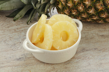 Marinated pineapple rings in the bowl