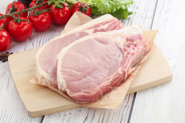 Raw pork t-bone steak for grill