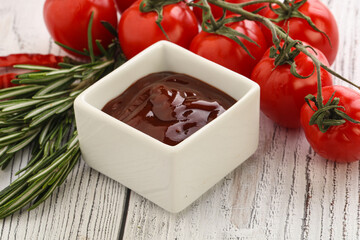 Tomato barbecue sauce on the bowl