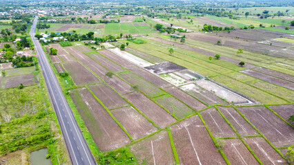 Fototapeta na wymiar Aerial drone view of green fields and farmland.
