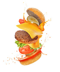 Ingredients for a homemade burger in the air isolated on a white background