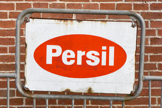 Old weathered retro Persil sign. Persil is a German brand of laundry detergent. Manufactured and marketed by Henkel around the world and first introduced in 1907